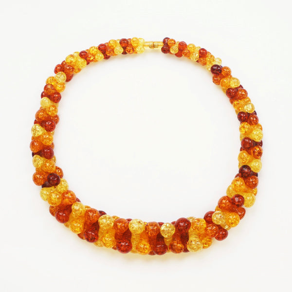 1980s vintage resin necklace in fiery red and amber beads