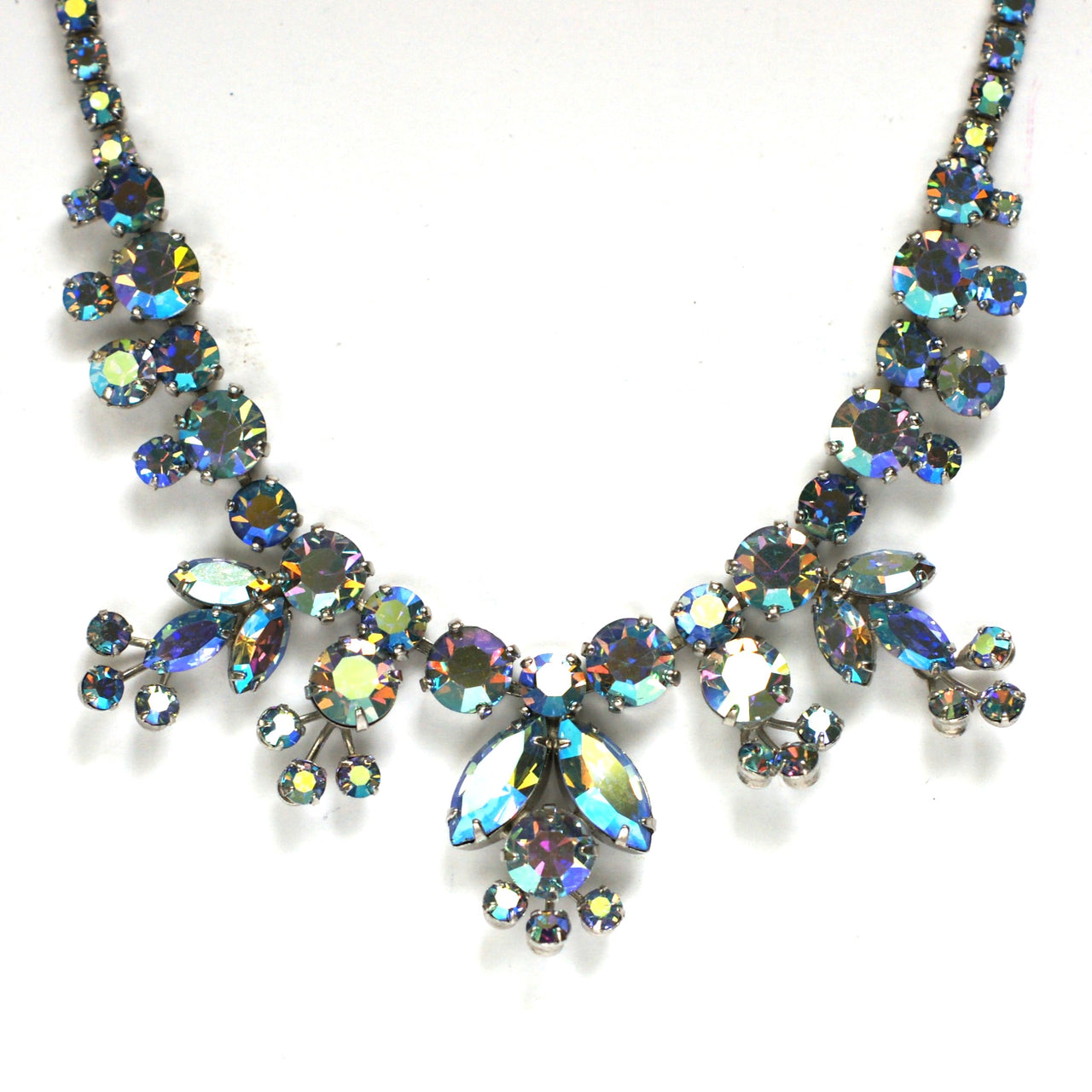 iridescent blue rhinestone necklace in white metal by Sherman from the 1950s