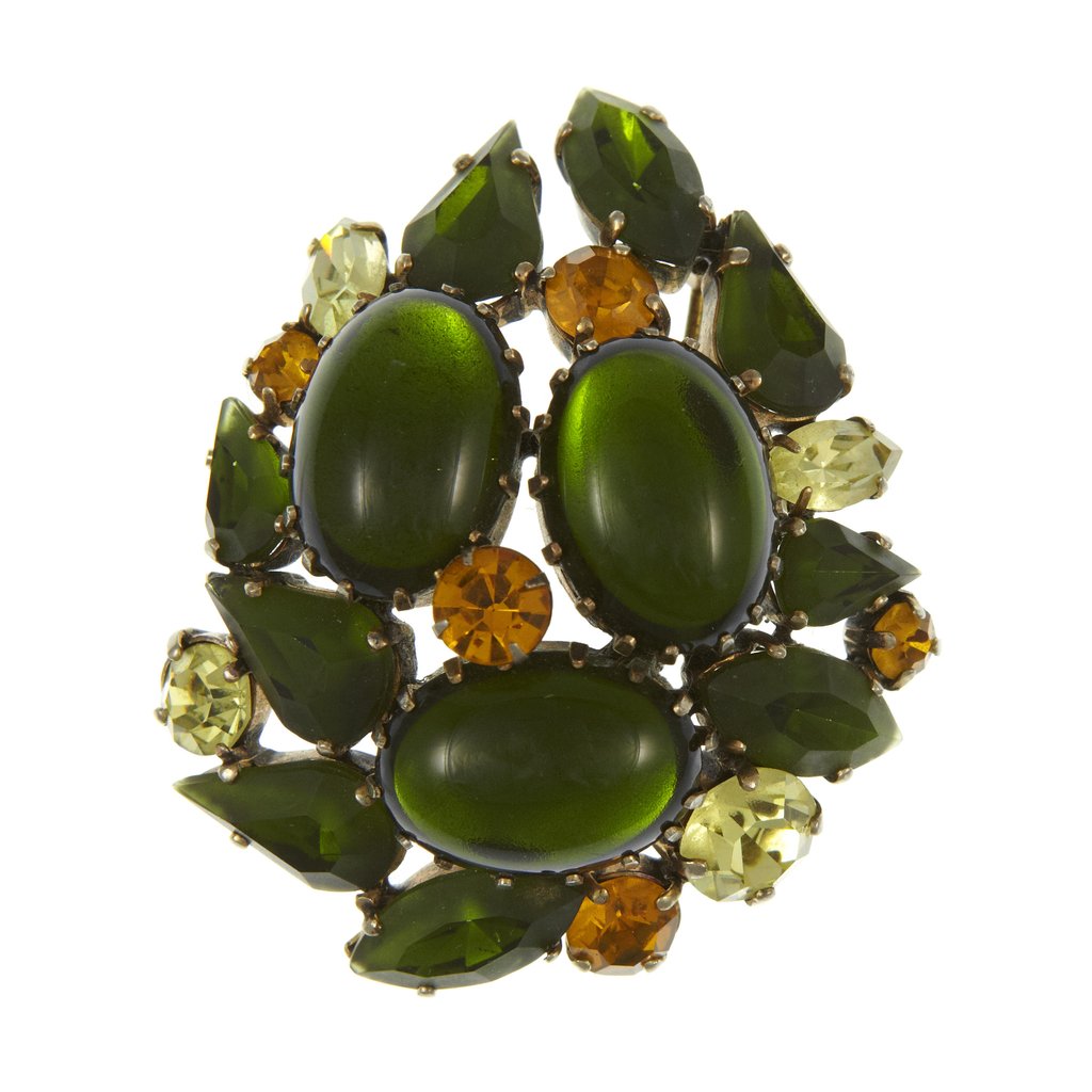 Vintage brooch with green and orange gemstones