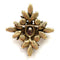 back of autumnal vintage brooch with brown, orange and olive green rhinestones on antique gold-plated metal