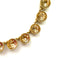 Stella & Dot Riviere necklace with light brown round faceted crystals in an old gold setting with an extension chain