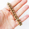 gold plated vintage curb link chain bracelet on hand