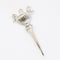 chrome vintage trifari brooch on white background