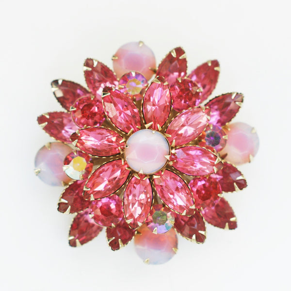 vintage pink rhinestones flower brooch on white background