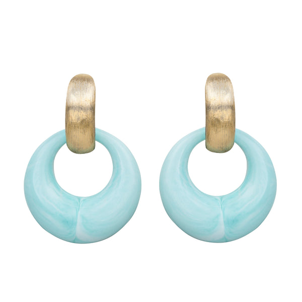 A pair of vintage hoop clip earrings with gold plating and multicolored resin hoops.