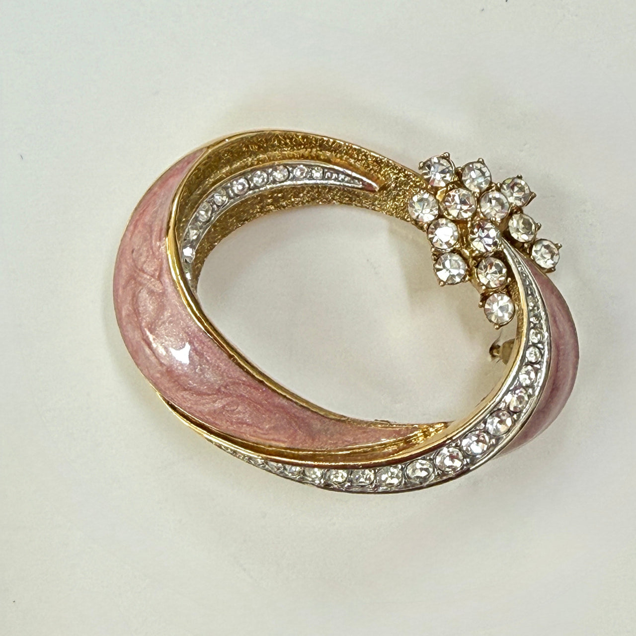 Gold plated pink enamel brooch by Attwood & Swyer