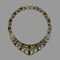 Gold plated necklace on a grey background
