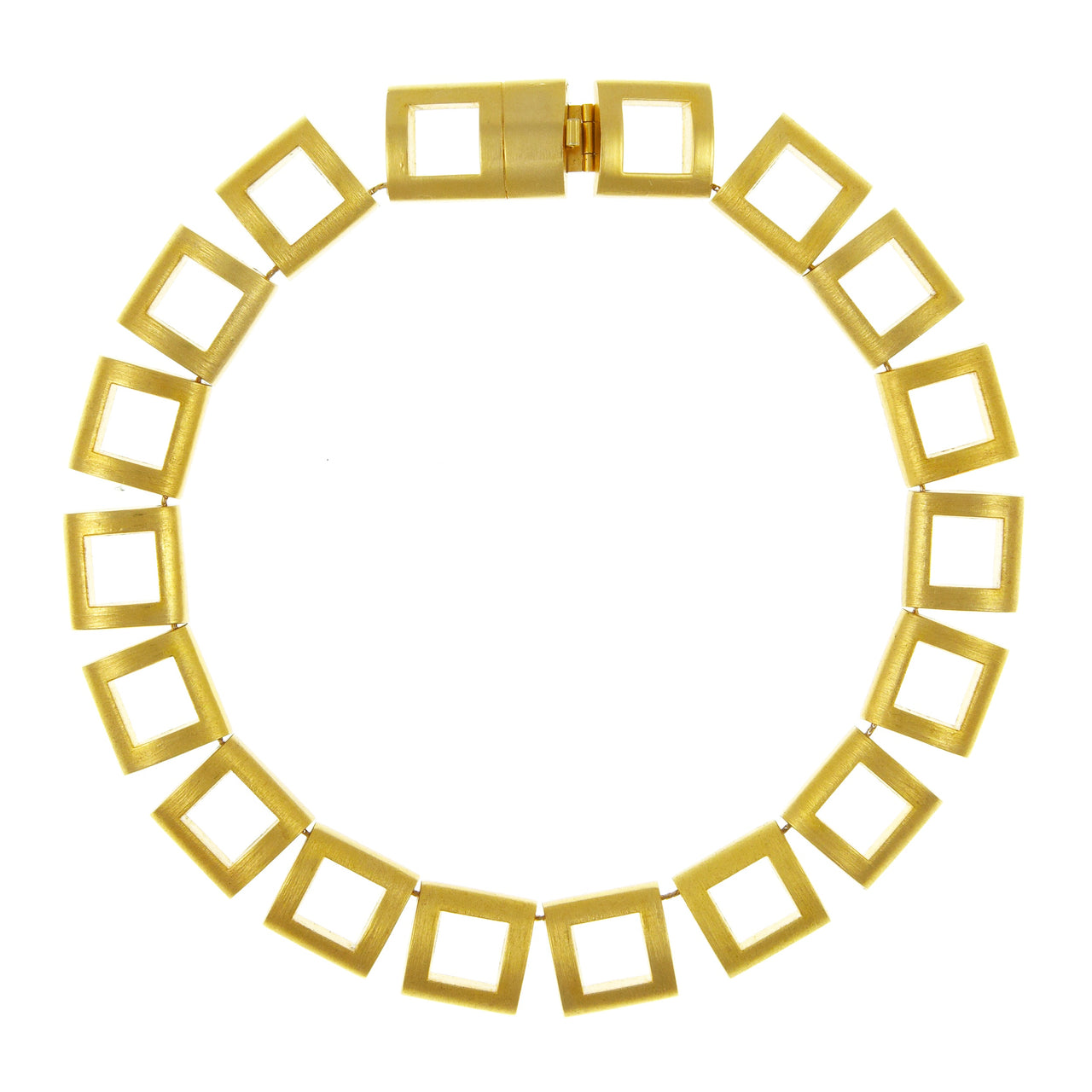 A gold-plated Helena Rubenstein necklace with square links and a metallic clasp.