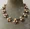 peach and grey necklace with grey and blue stones by J Crew