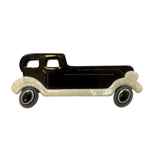 black car brooch by Lea Stein 