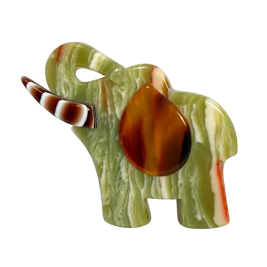 A small elephant-shaped brooch made from marbled resin, featuring green, white, and brown patterns with a polished amber-brown central inlay, shown on a plain light background. Lea Stein vintage