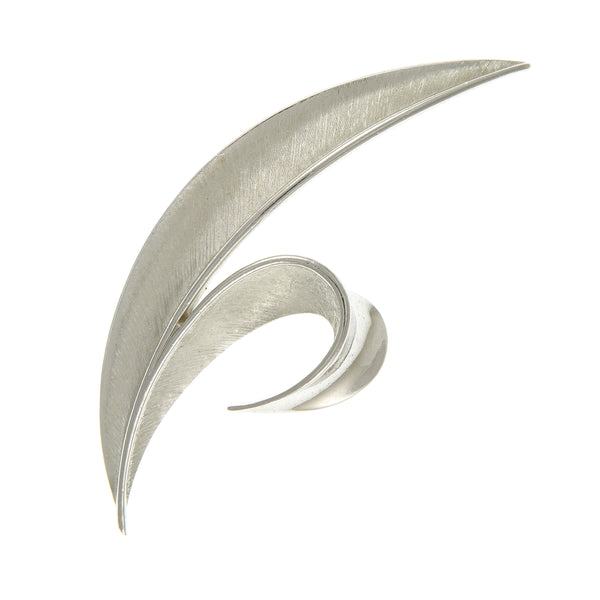 abstract brooch by Trifari from the 1960s in rhodium plate