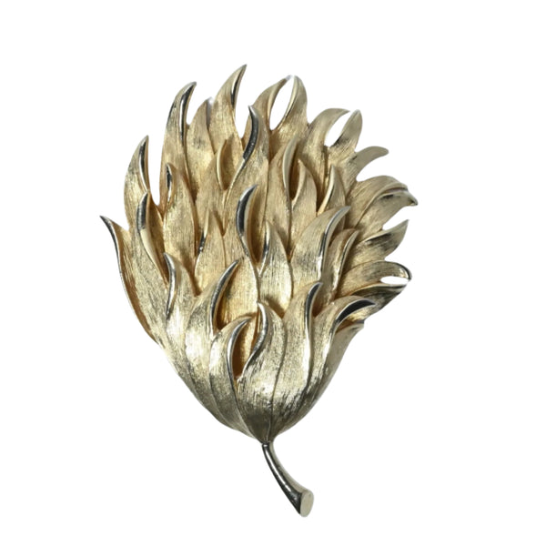 Vintage gold plated Kramer brooch in a quiet gold plate and leaf design
