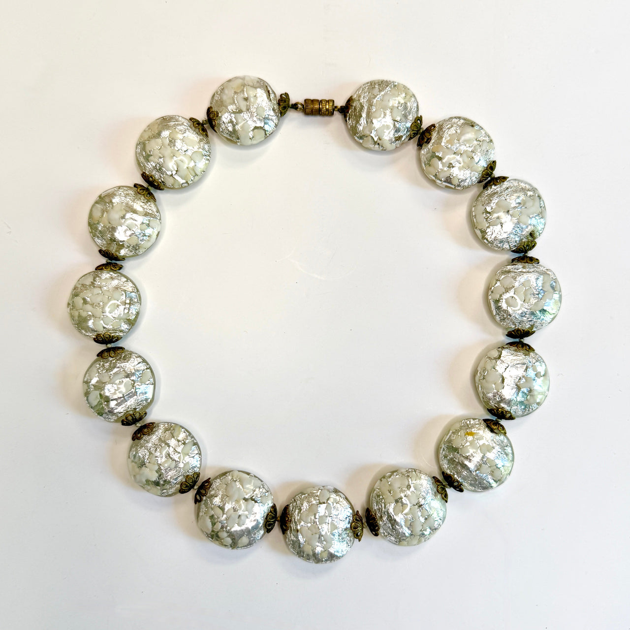 silver venetian glass bead necklaceon a white background