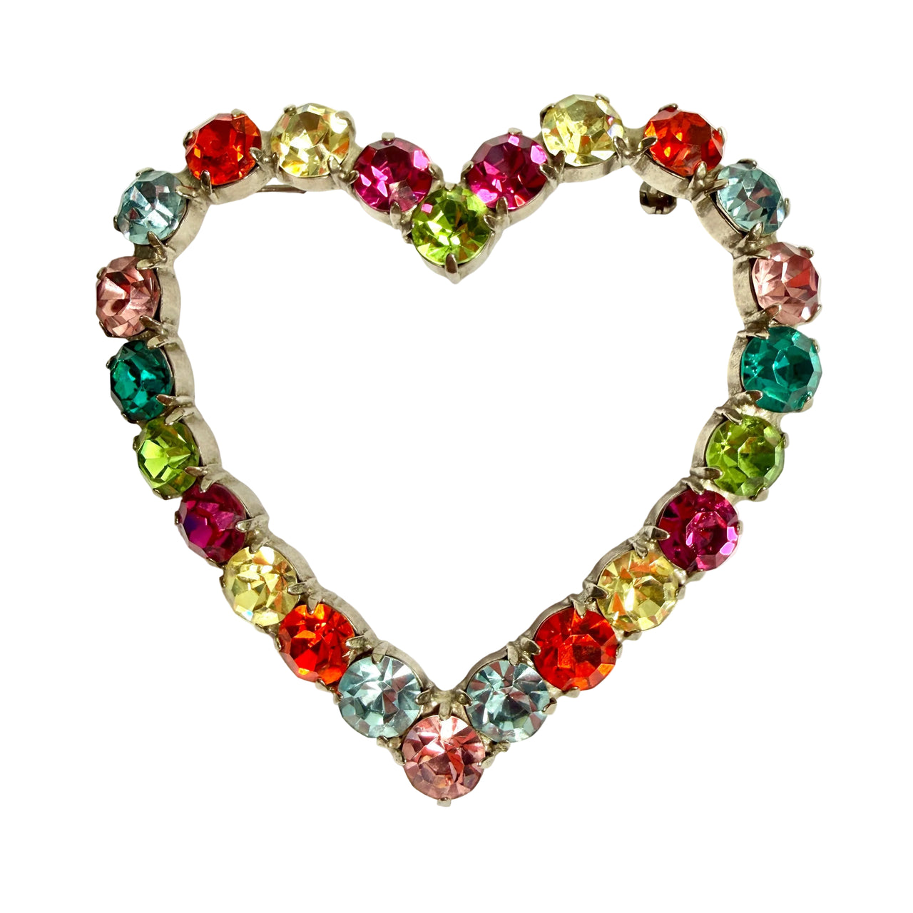 brightly coloured heart shaped brooch on  a white background vintage large statement