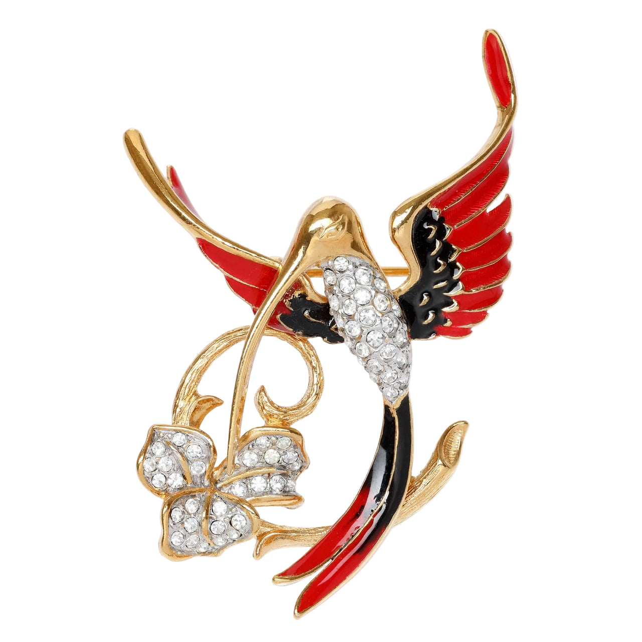 A gold-toned bird brooch with red and black enamel details, decorated with clear pavé rhinestones on the beak and bow, set against a plain light gray background.