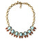 J crew vintage necklace with turquoise rectangular stones and pearshape deep red stones with a matte gold-plated chain