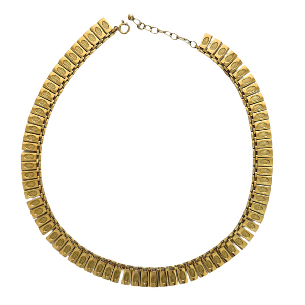 Gold necklace on a white background