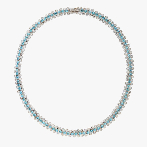 Necklace with blue and clear crystals on a white background