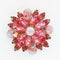 vintage pink rhinestones flower brooch on white background