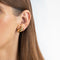 Gold-plated vintage clip on earrings on model