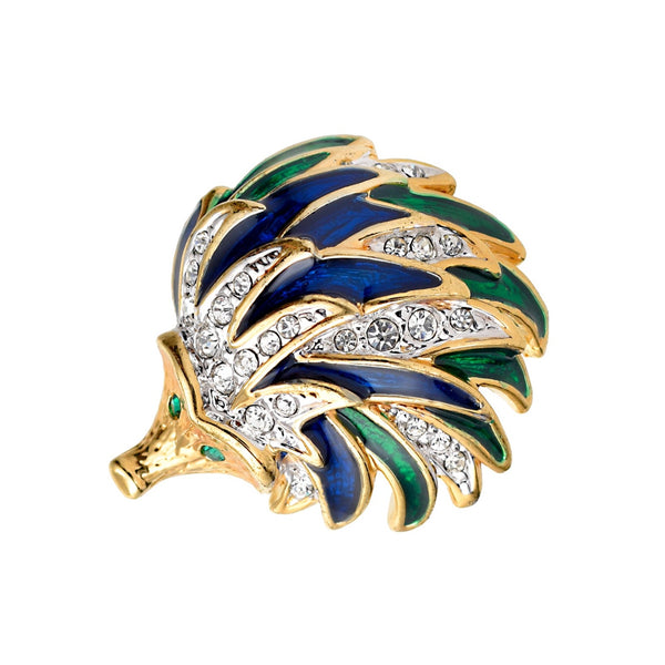 A vintage brooch in the shape of a hedgehog with blue and green enamel and gold plating, adorned with Swarovski crystals.